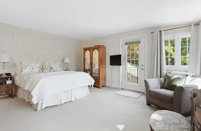 Spacious bedroom with an antique wardrobe
