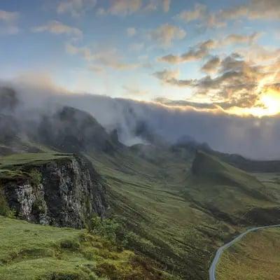 Green cliffs in the mist
