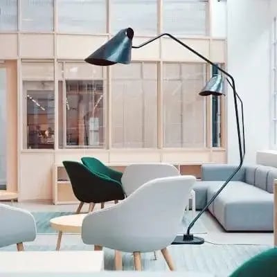 Designer living room with white armchairs